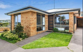 Walk to Torquay surf beach shops cafes and golf